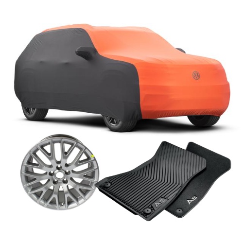 Display including vehicle floor mats, wheels, and orange car cover